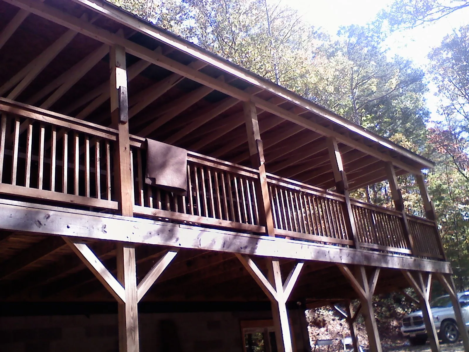 Timber framing under a new elevated porch and deck — Roof Leak Repair in Williamsburg by Roofing Brothers
